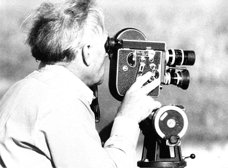 Douglas Fisher operating a Bolex cine camera